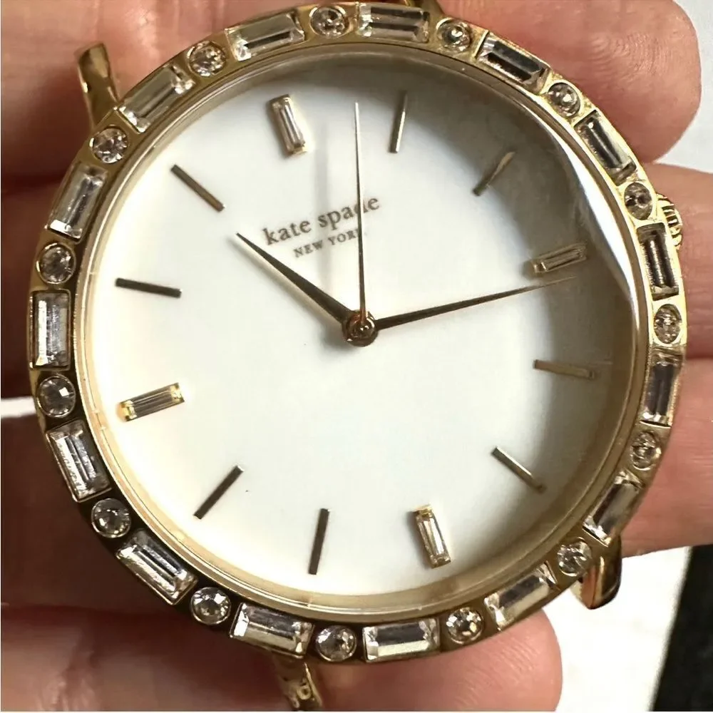 Kate Spade gold tone rhinestone watch face